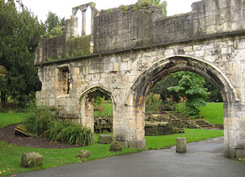 Medieval ruin - stone wall with arch