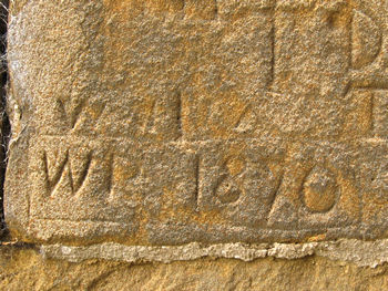 Alne church – graffiti carved in stone