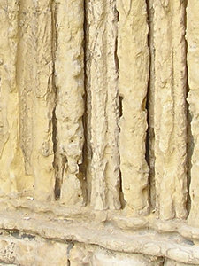 St Giles, doorway – badly weathered stone 