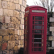 Ancient and modern: Red phonebox by Marygate Tower