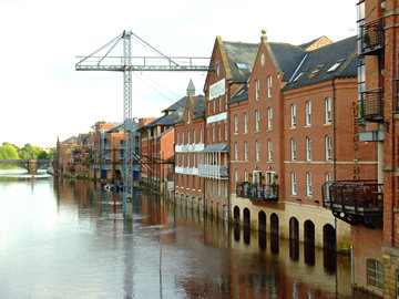 Riverside buildings and floodwater