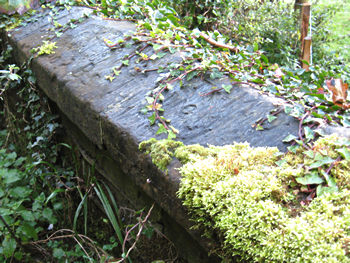 Carved graffiti on stone coping, Birdsall, Yorkshire