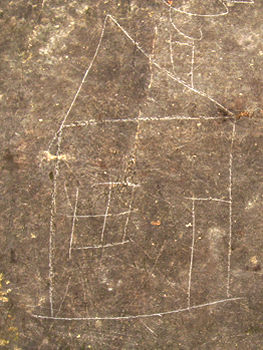 Child's drawing of a house, scratched into stone, York