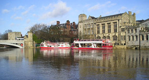 Boats moored in front of the the Guildhall, on the riverside