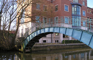 DEFRA building, by the river Foss, Peasholme Green, York, behind a fine old iron bridge. 25 January 2004