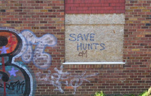 Graffiti on the wall of the abandoned INL club – 'Save hunts'