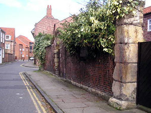 Aldwark development and preserved section of wall