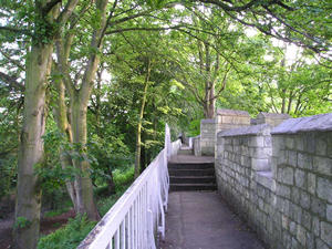 The walls in summer, under a canopy of branches