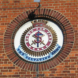 Crest from front of building