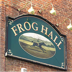 Frog Hall – sign on side of building