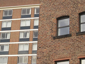 Mill House and modern hotel building, North Street