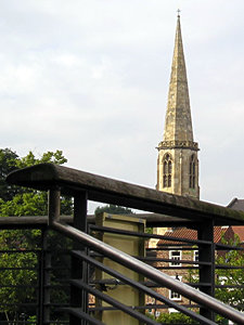 Spire of All Saints. on the opposite bank
