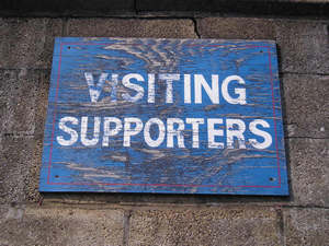 Sign: Visiting supporters