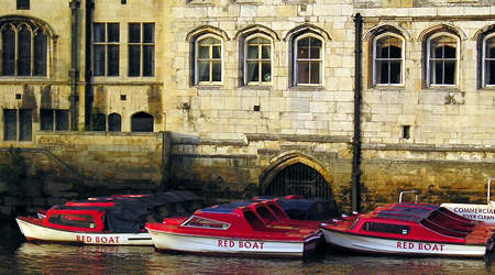 Guildhall and red boats, summer evening