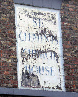 Battered old sign – isn't it lovely – reads 'St Clement's Church House'