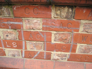 Bricks showing initials