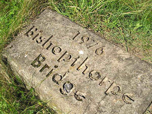 Stone marker reads: 1976 – Bishopthorpe Bridge