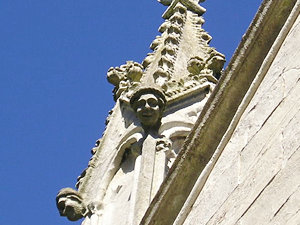 Cheerful faces, in stonework
