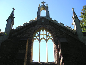 Silhouette of old St Andrew's against summer sky